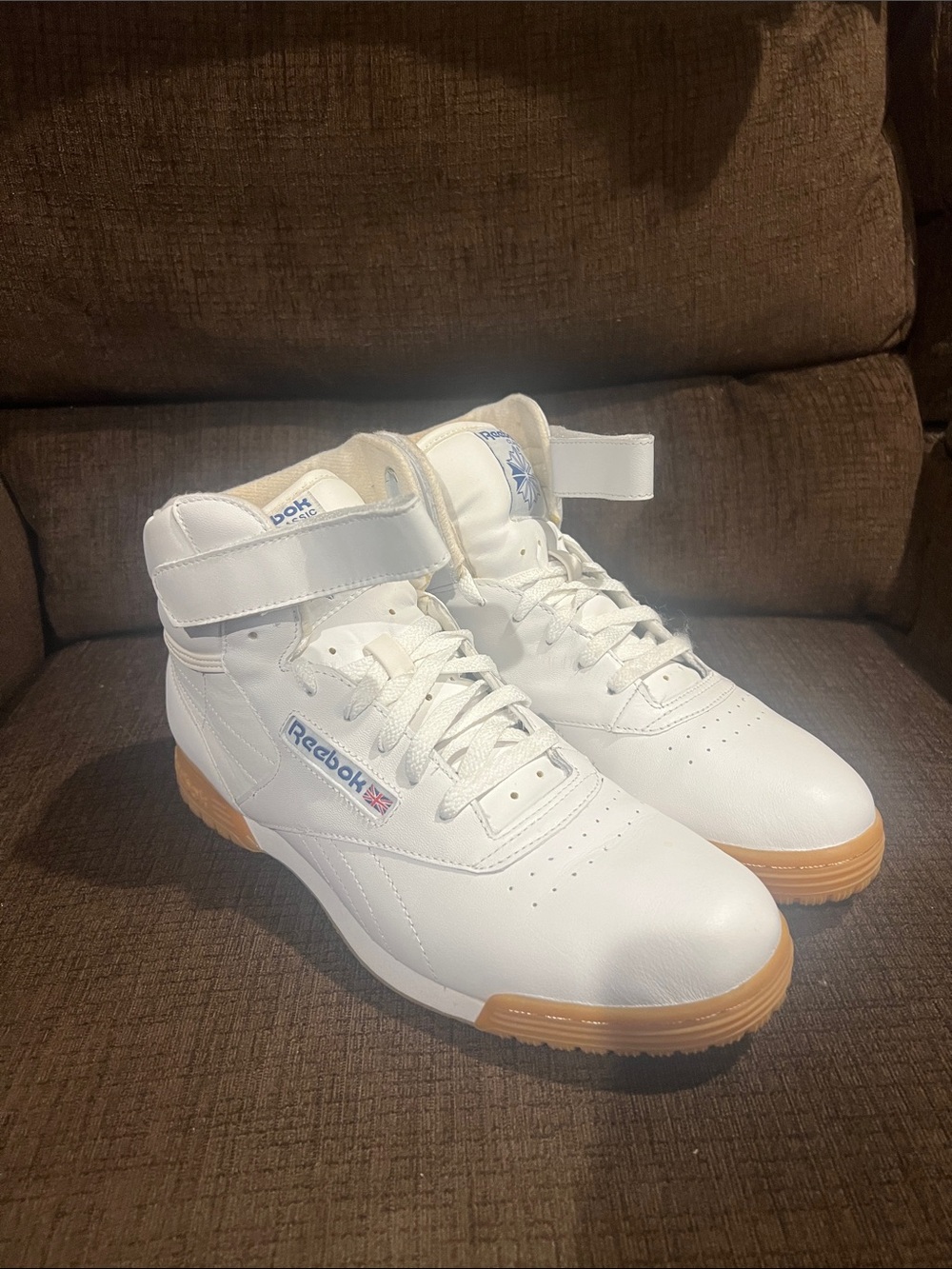Classic Mens Reebok White High-Top Lifestyle Sneakers. Slightly worn.